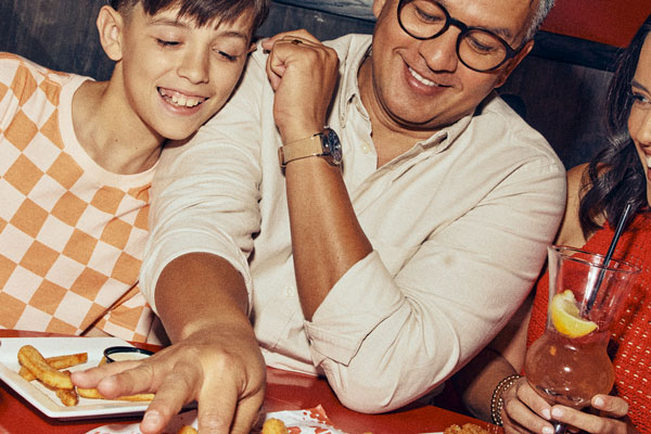 Father and son enjoying Red Robin